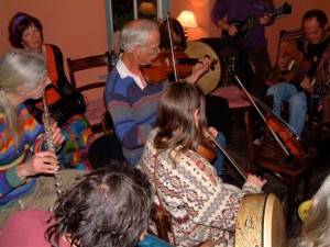 Musicians playing at a folk night in Cwmdu Inn